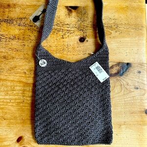 The Sak handbag. Gray. Measures 9” Width, 10” Length.